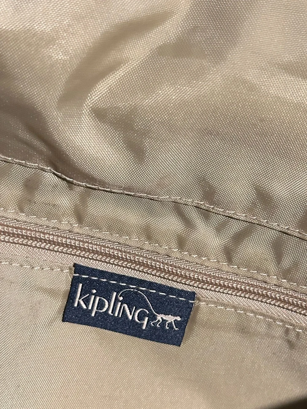 Kipling Dark Blue Expandable Messenger Bag with Monkey Charm